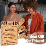 Yellow Apjielop bamboo cutting board with "Recipe for a best friend" engraving, alongside bamboo spatulas and spoons.