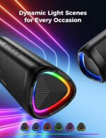 Black BolaButty portable Bluetooth speaker with colorful LED lights, shown outdoors on a picnic blanket.