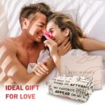 A beige Craftique "I Love You" flannel throw blanket, 60 by 50 inches, featuring romantic words and happy smile patterns.
