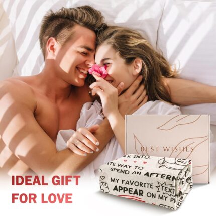 A beige Craftique "I Love You" flannel throw blanket, 60 by 50 inches, featuring romantic words and happy smile patterns.