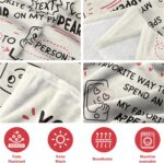 A beige Craftique "I Love You" flannel throw blanket, 60 by 50 inches, featuring romantic words and happy smile patterns.