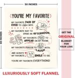 A beige Craftique "I Love You" flannel throw blanket, 60 by 50 inches, featuring romantic words and happy smile patterns.