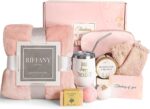 Suhctuptx pink birthday gift basket for women, including a flannel blanket, tumbler, candle, and bath bombs.
