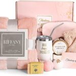 Suhctuptx pink birthday gift basket for women, including a flannel blanket, tumbler, candle, and bath bombs.