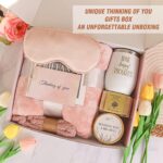Suhctuptx pink birthday gift basket for women, including a flannel blanket, tumbler, candle, and bath bombs.