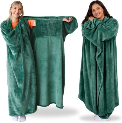 Adult wearing a Super Blanky Forest Green wearable blanket, lounging comfortably on a couch, showcasing its plush fabric and