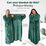 Adult wearing a Super Blanky Forest Green wearable blanket, lounging comfortably on a couch, showcasing its plush fabric and