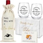 A YENCHORN housewarming gift basket featuring two round 15oz wine glasses, a wine bag, and a card inside a gift box.